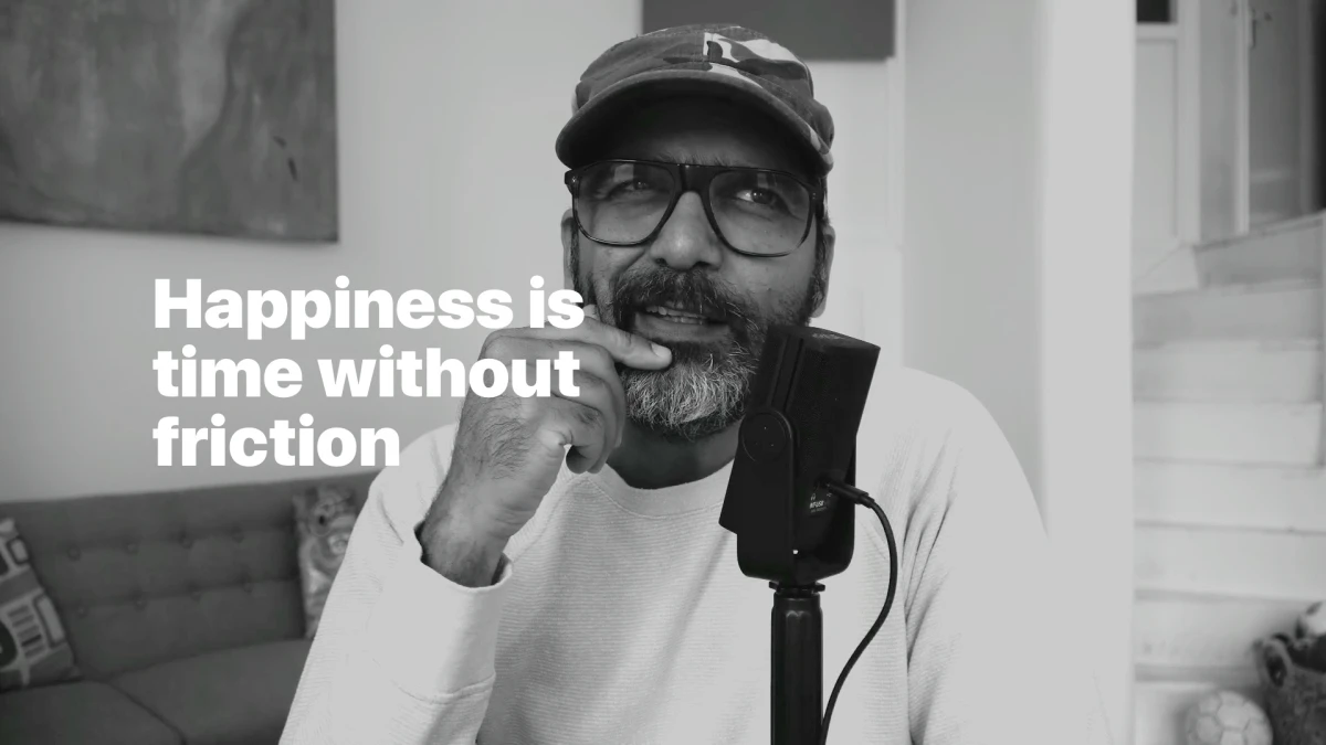 Happiness is time without friction